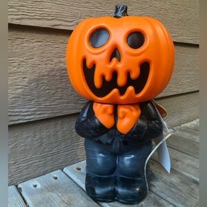 Orange Pumpkin Head Figurine